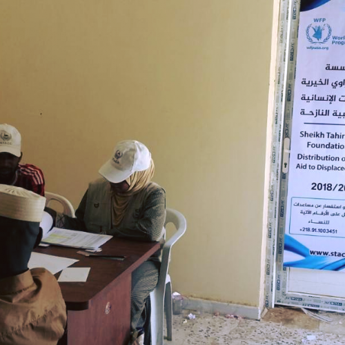 Distributing food baskets before Ramadan